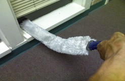 Detailed carpet cleaning around office furniture